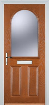 Wimbledon Gold Lead composite door in Oak